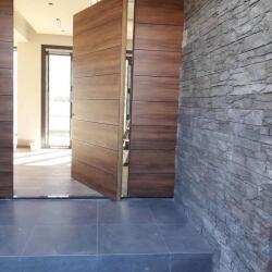Pivot Door With Wall Paneling